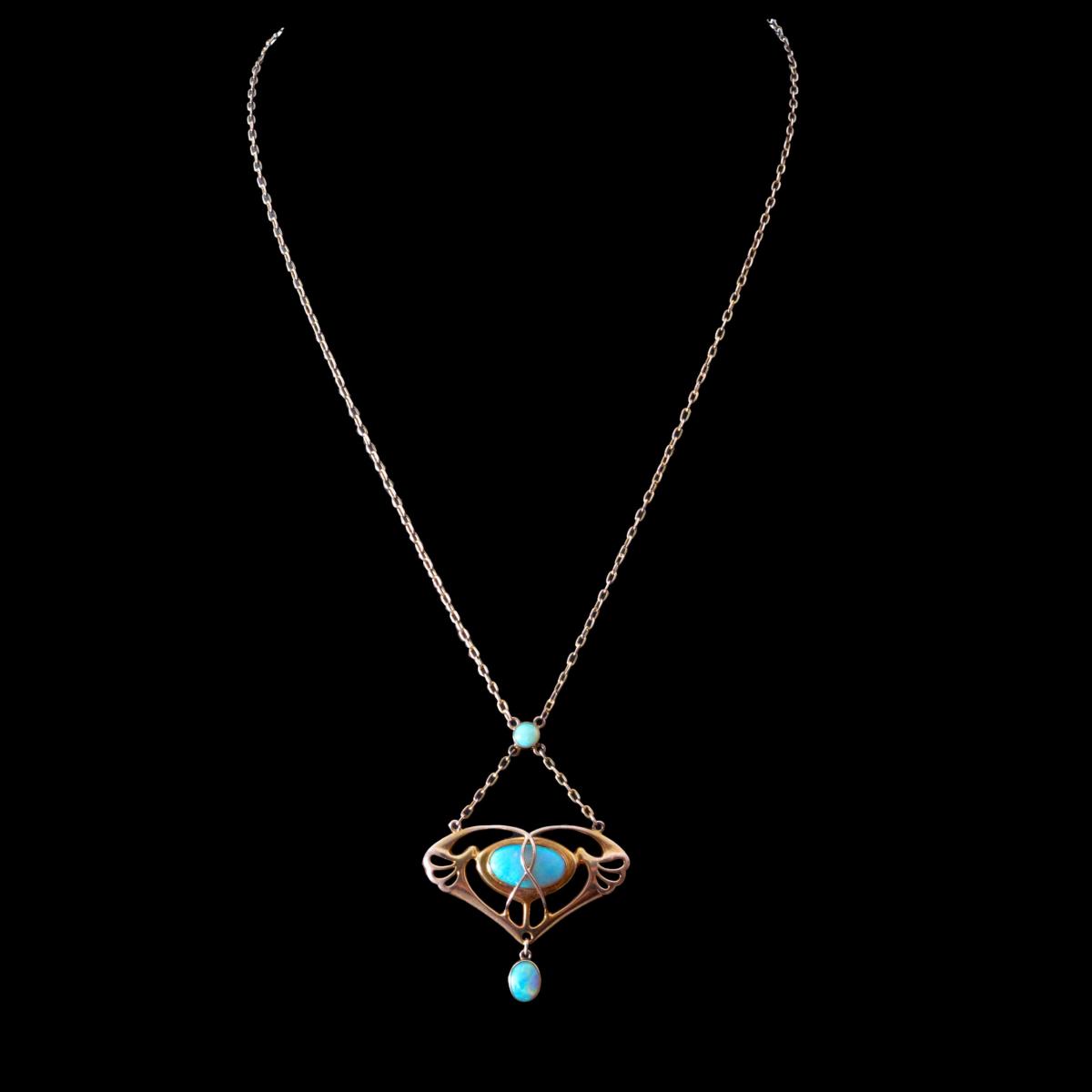 A Barnet Henry Joseph gold and opal pendant