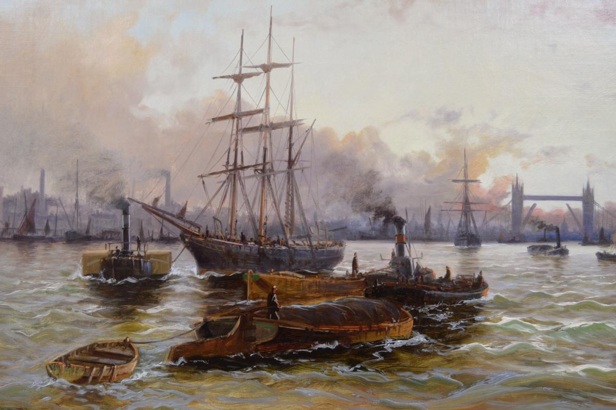 Riverscape oil painting of shipping on the Thames with Tower Bridge in the distance by Edward Fletcher
