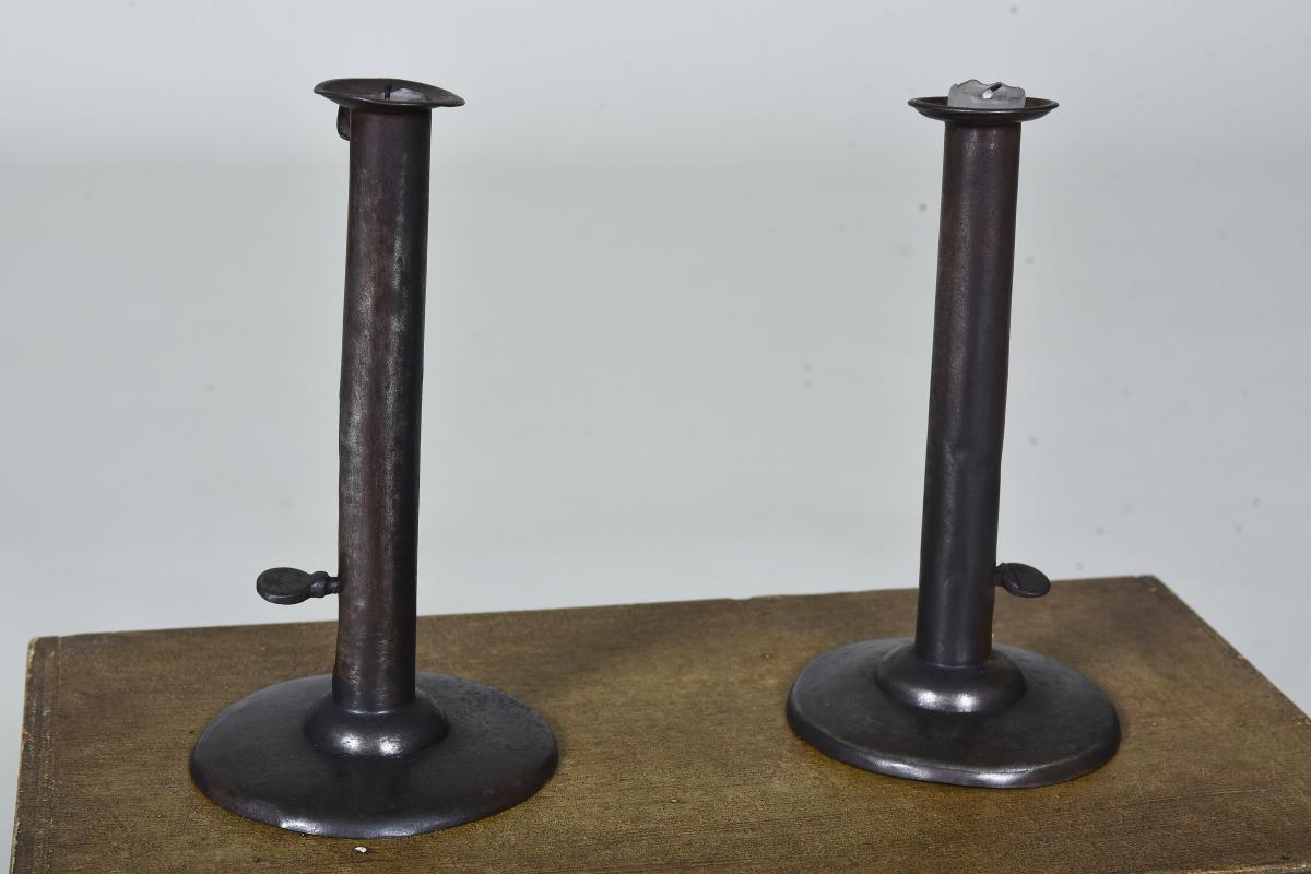 19th century sheet metal 'hog scraper' candlesticks
