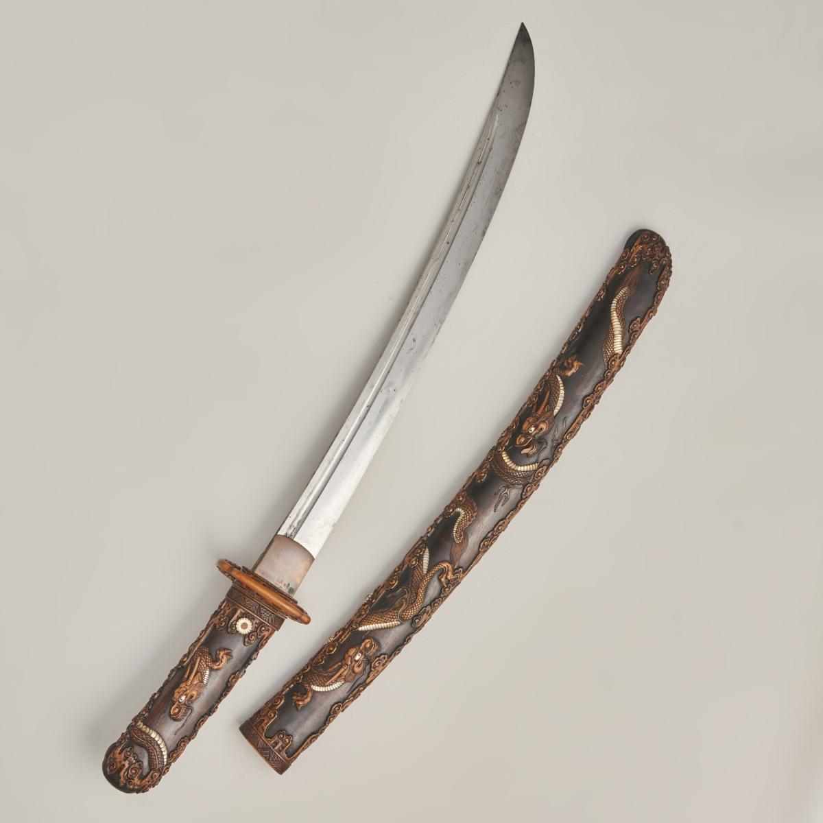 A fine Japanese Wakizashi Samurai sword with wood scabbard, (Japanese Circa 1880)