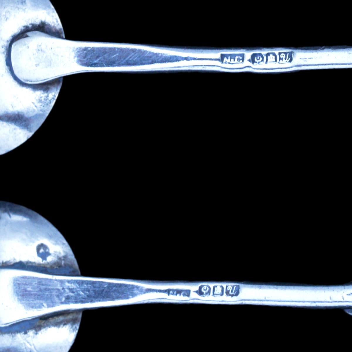 A set of three Norah Creswick silver stone set condiment spoons