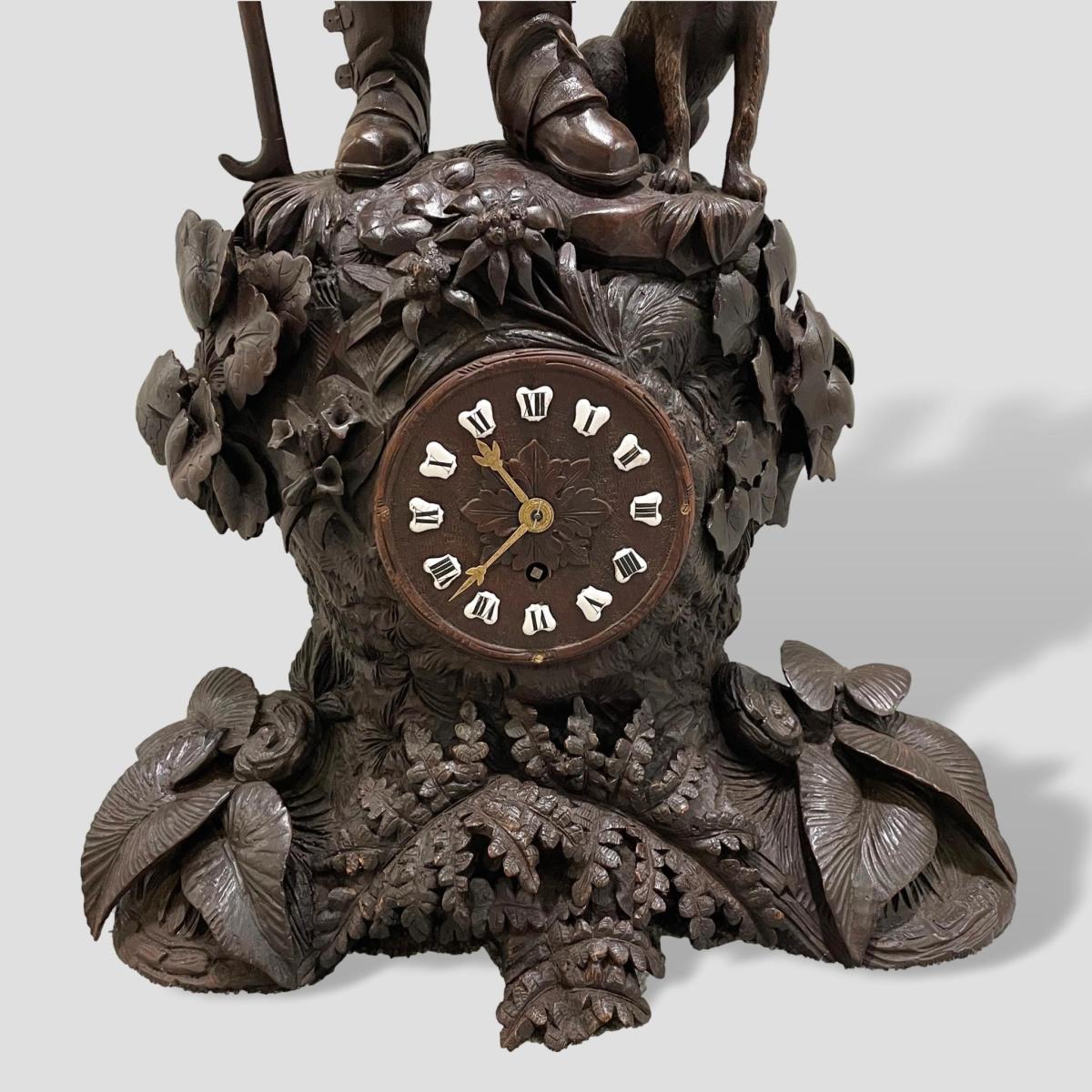 A Black Forest Carved Hunt Clock