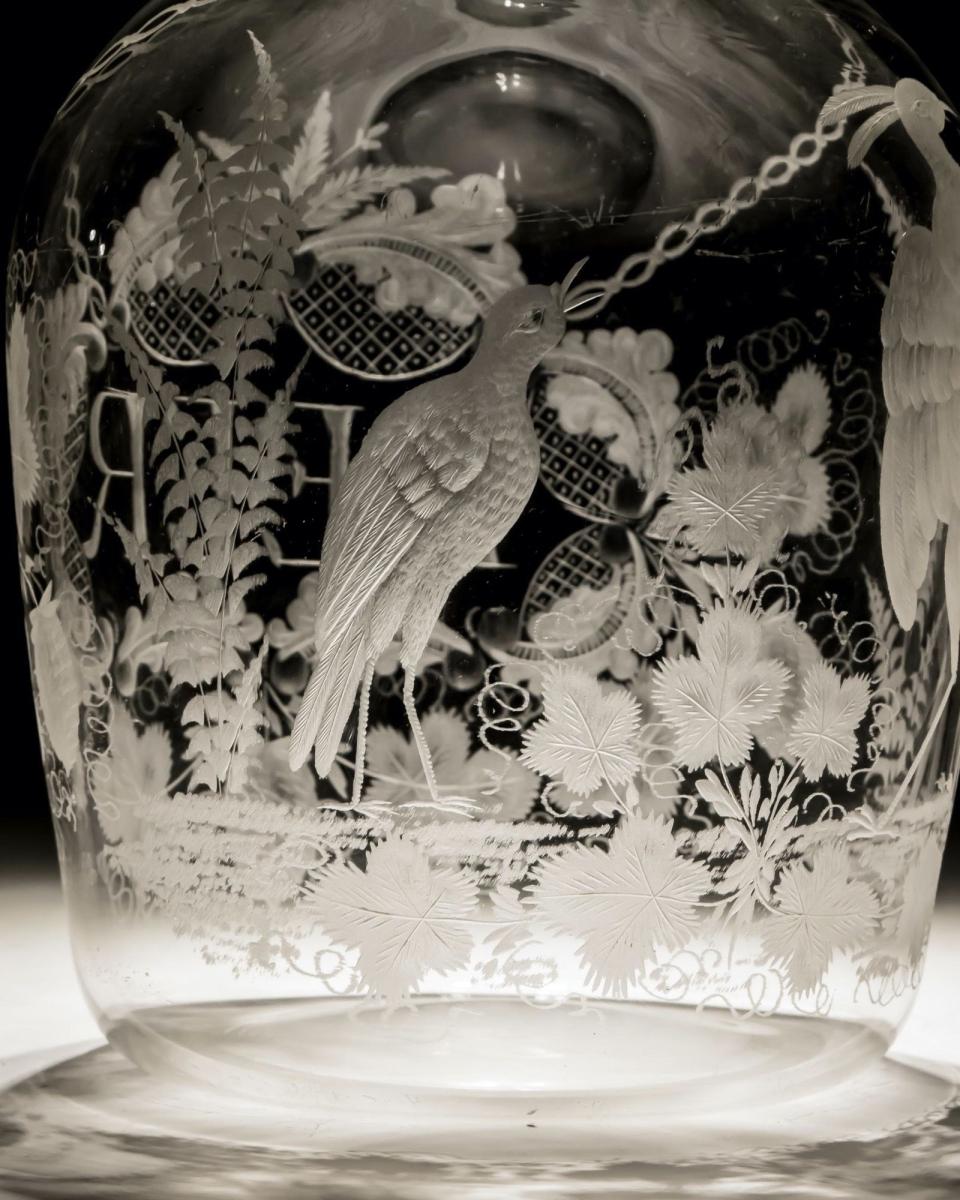 An Elaborate Engraved George III Magnum Beer Decanter