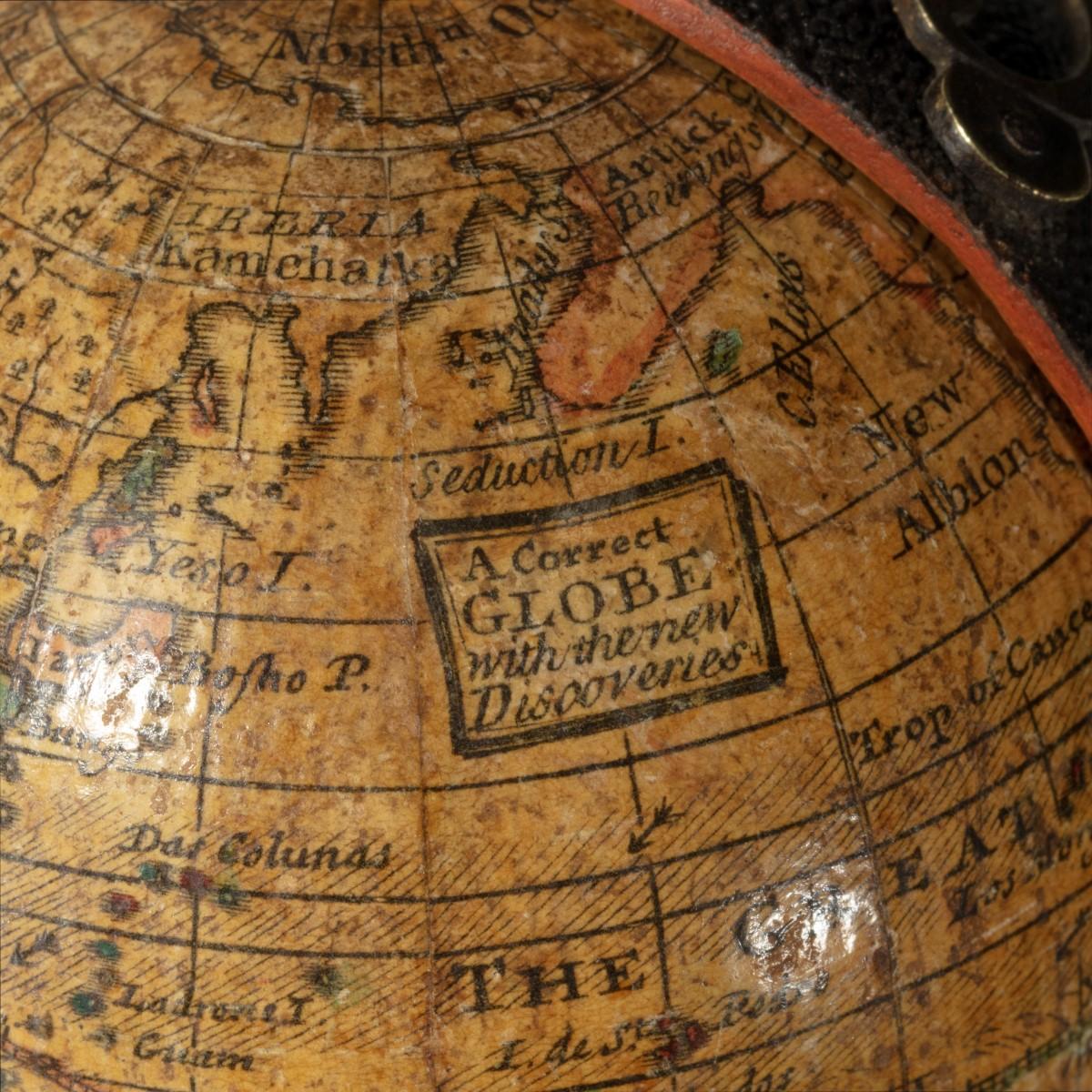 A 3 inch George III pocket globe after Herman Moll