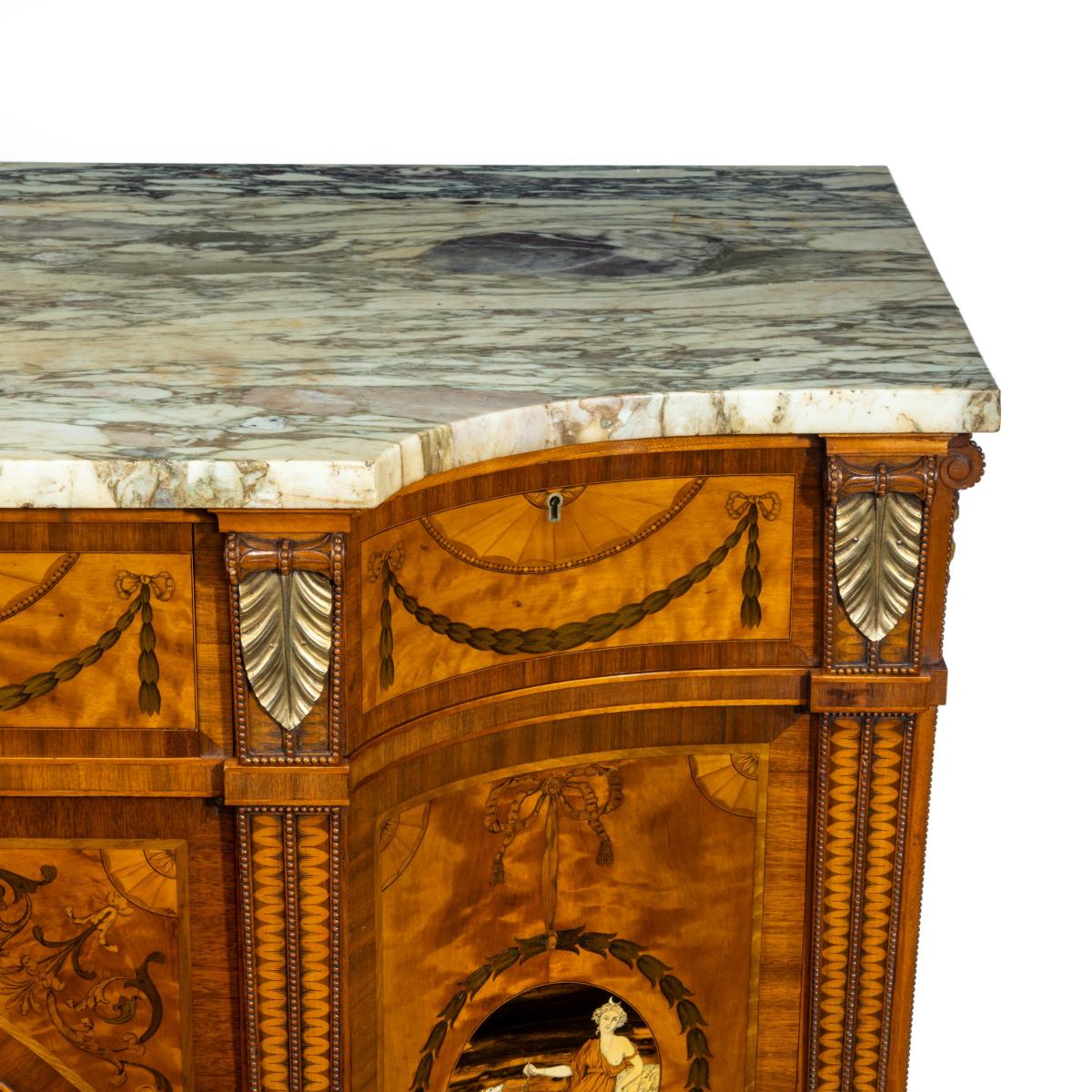 A satinwood Sheraton Revival breakfront marquetry commode