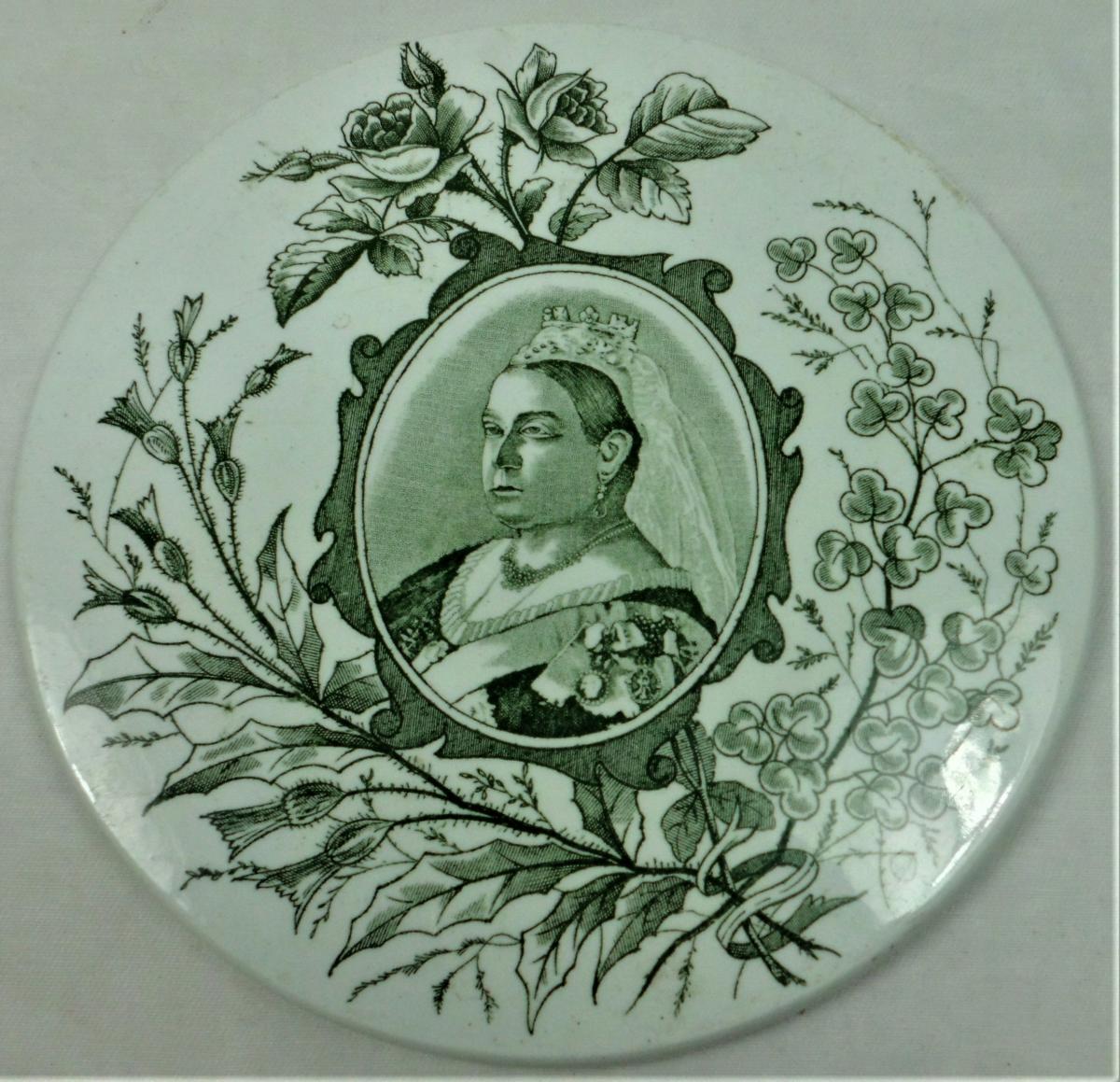 A small ceramic scale pan green transfer printed for Queen Victoria's Jubilee 1887