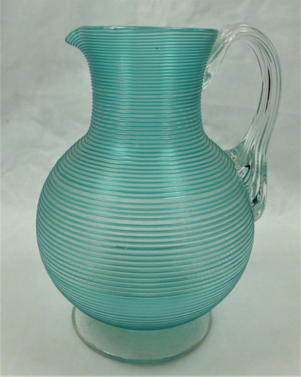 A large crystal glass jug with applied blue trail, English circa 1880