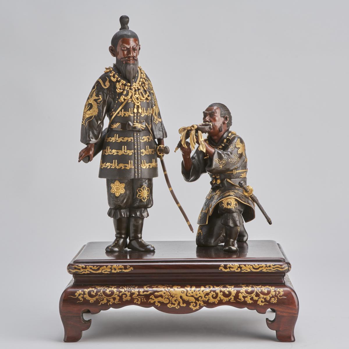 A stunning antique Japanese Bronze and multi-metal Okimono group depicting Emperor Jimmu