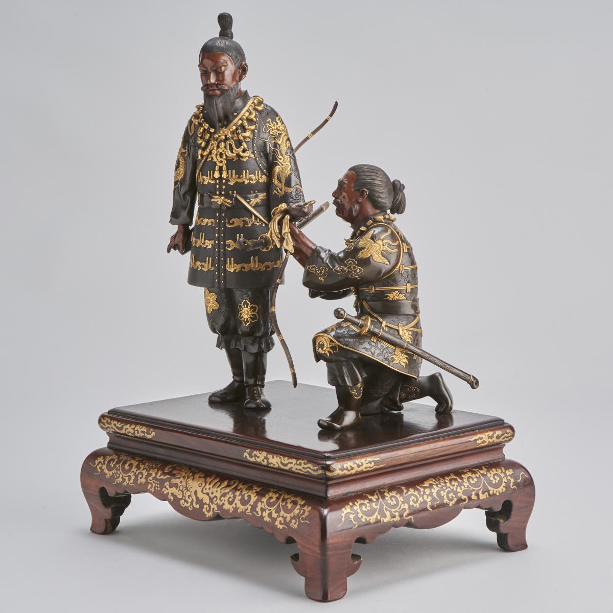 A stunning antique Japanese Bronze and multi-metal Okimono group depicting Emperor Jimmu