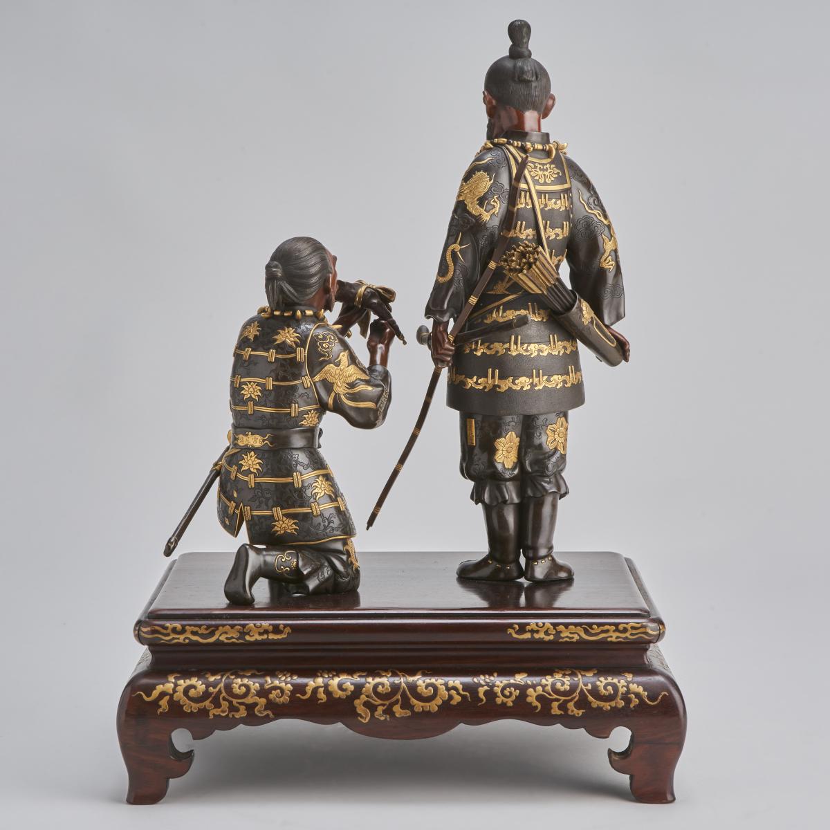 A stunning antique Japanese Bronze and multi-metal Okimono group depicting Emperor Jimmu