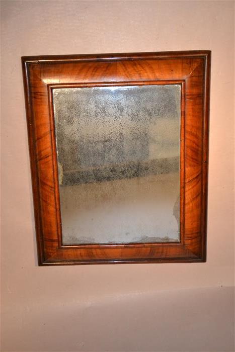 A Queen Anne walnut cushion frame mirror