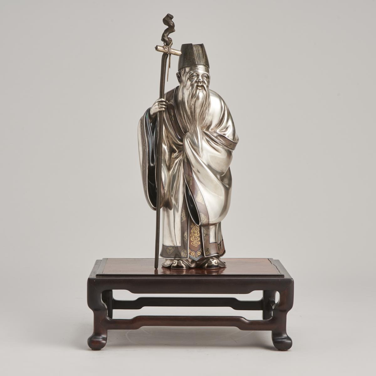 A serene, Japanese Meiji-era Silver Okimono of Jurojin (One of the 7 Lucky Gods)