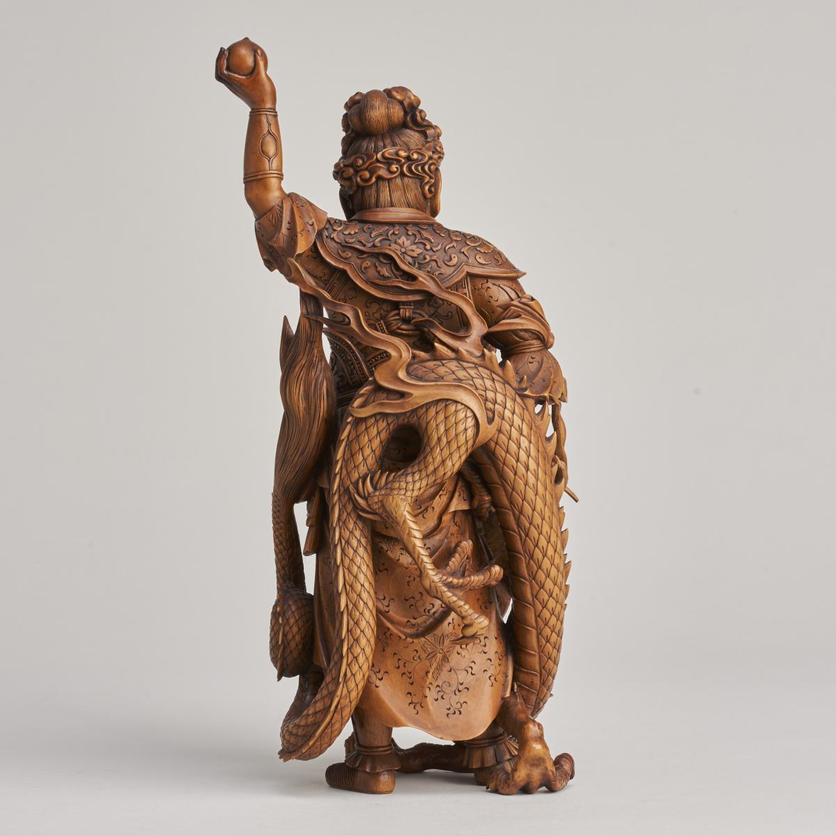 A beautiful, late 19th Japanese Century wood carving Okimono of Ryujin, God of the Sea