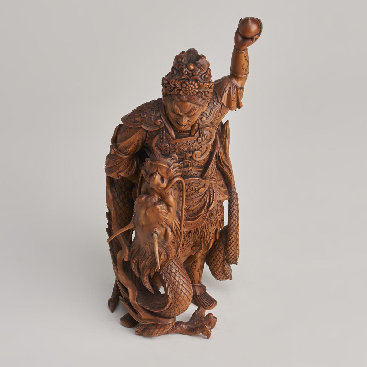 A beautiful, late 19th Japanese Century wood carving Okimono of Ryujin, God of the Sea