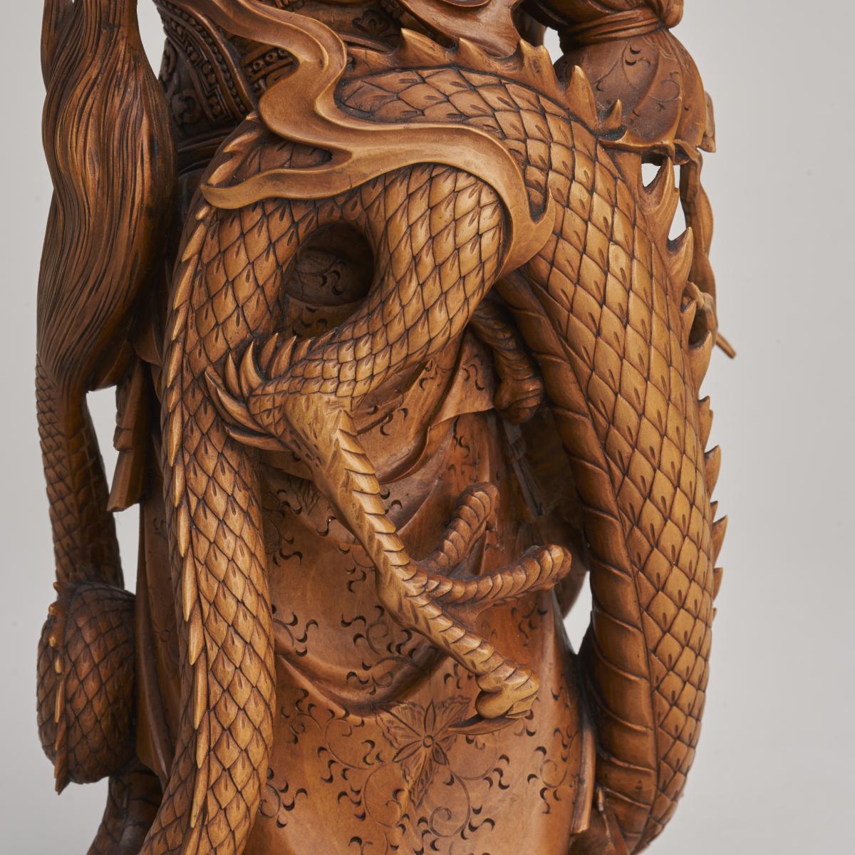 A beautiful, late 19th Japanese Century wood carving Okimono of Ryujin, God of the Sea