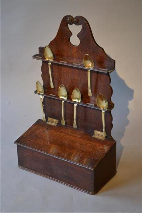 A Regency oak spoon rack