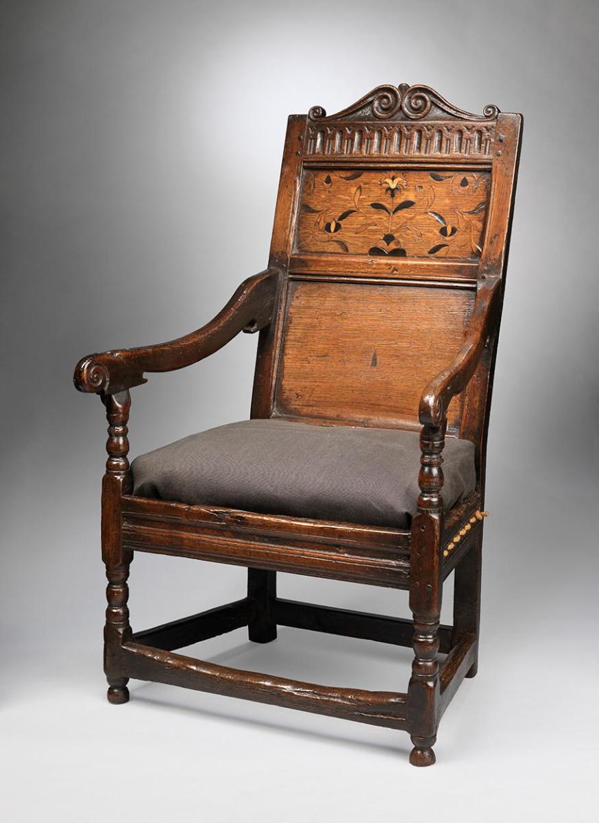 Unusual Twin Ram's Horn Scroll Crested Wainscot Armchair With Floral Marquetry Inlay to the Upper Panel Solid Oak with Ebony, Box and Sycamore Details English, c.1670
