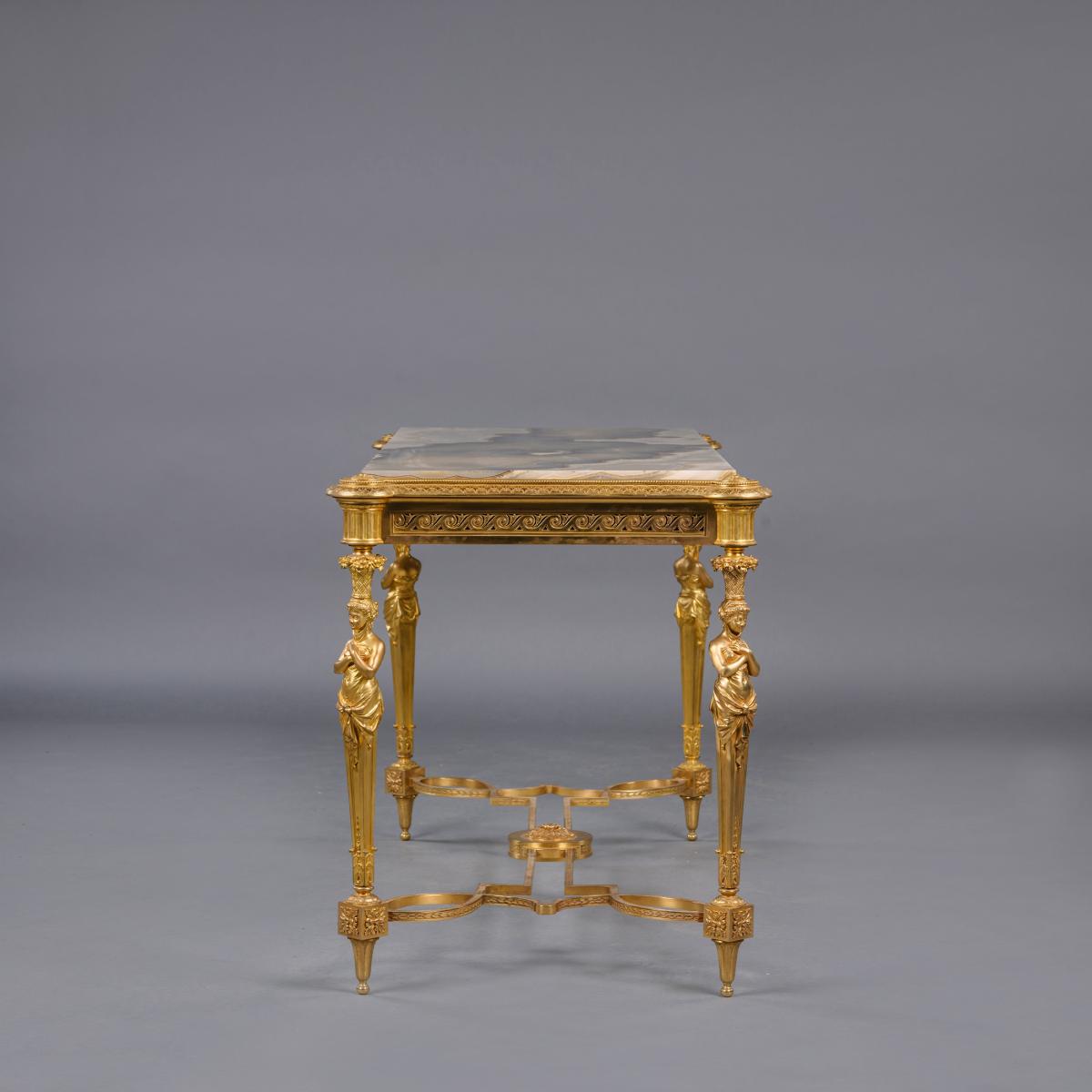 A Napoleon III Gilt-Bronze and Onyx Centre Table, By Maison Marnyhac, Paris. 