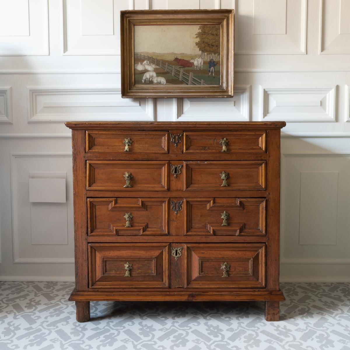 A 17th century pine chest of drawers, pictured straight on