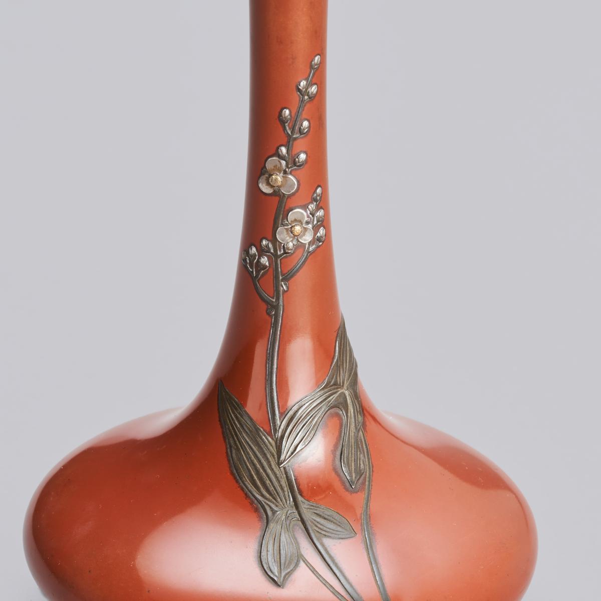 Japanese bronze and multi-metal vase inlaid with cherry blossoms and taro leaves, signed in a seal Jomi Eisuke II 
