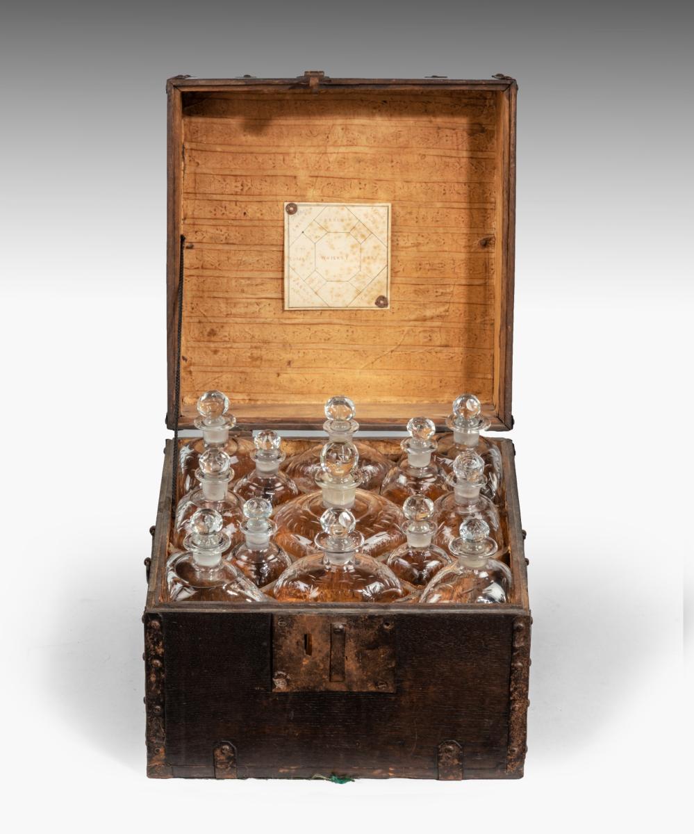 Antique Eighteenth Century decanter box with cut glass decanters