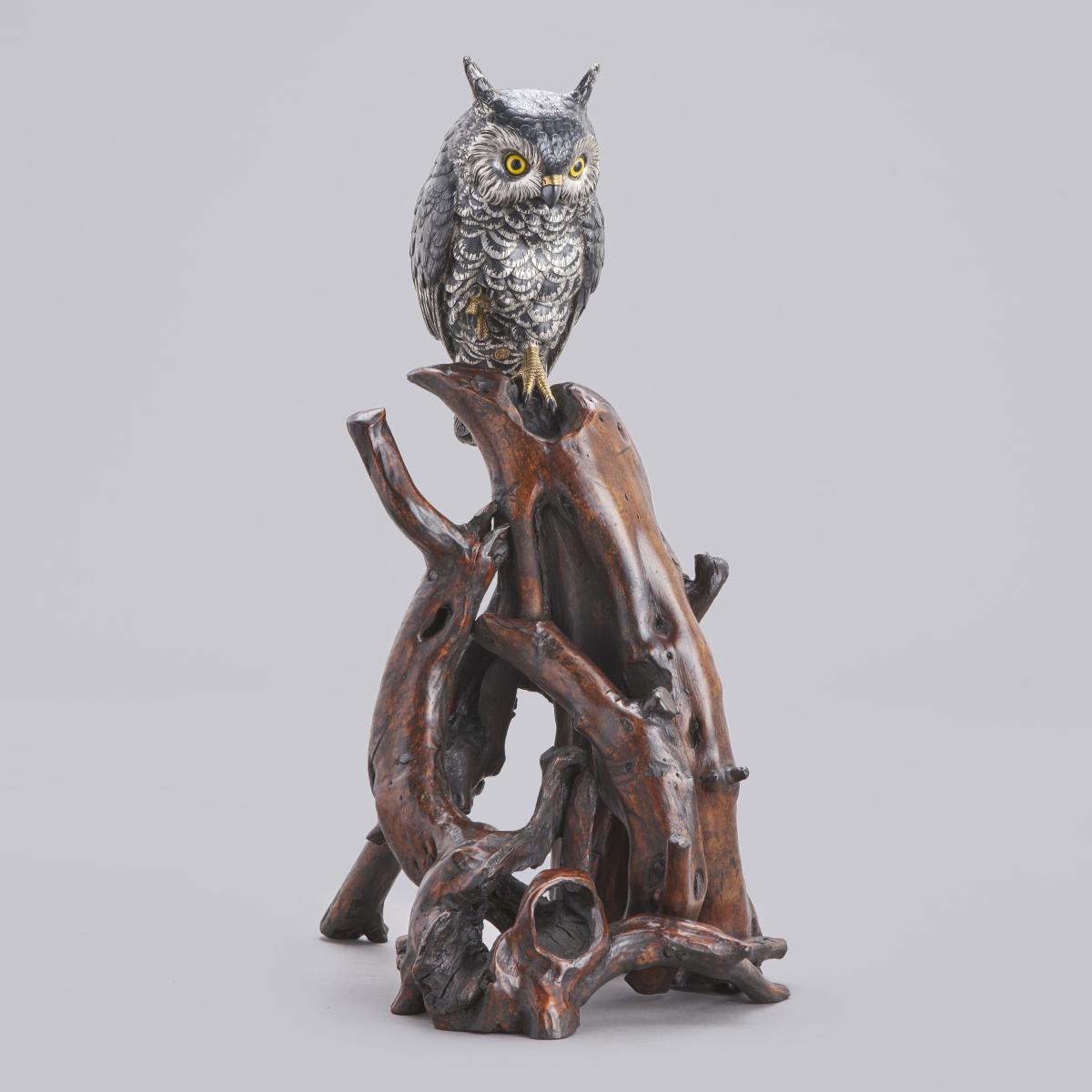 Japanese bronze owl perched on a root wood base signed Hideharu Meiji period