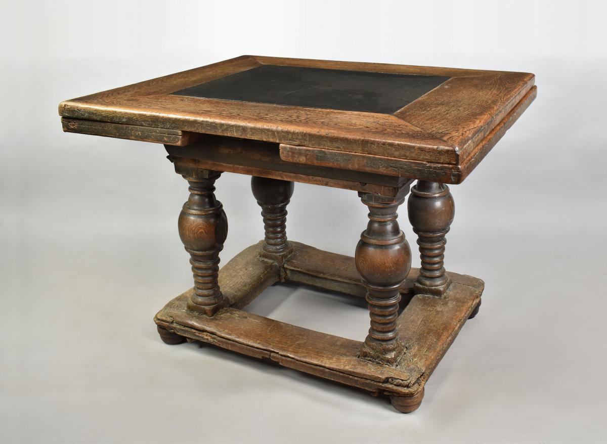Flemish oak drawleaf table with inset slate tops, c.1650