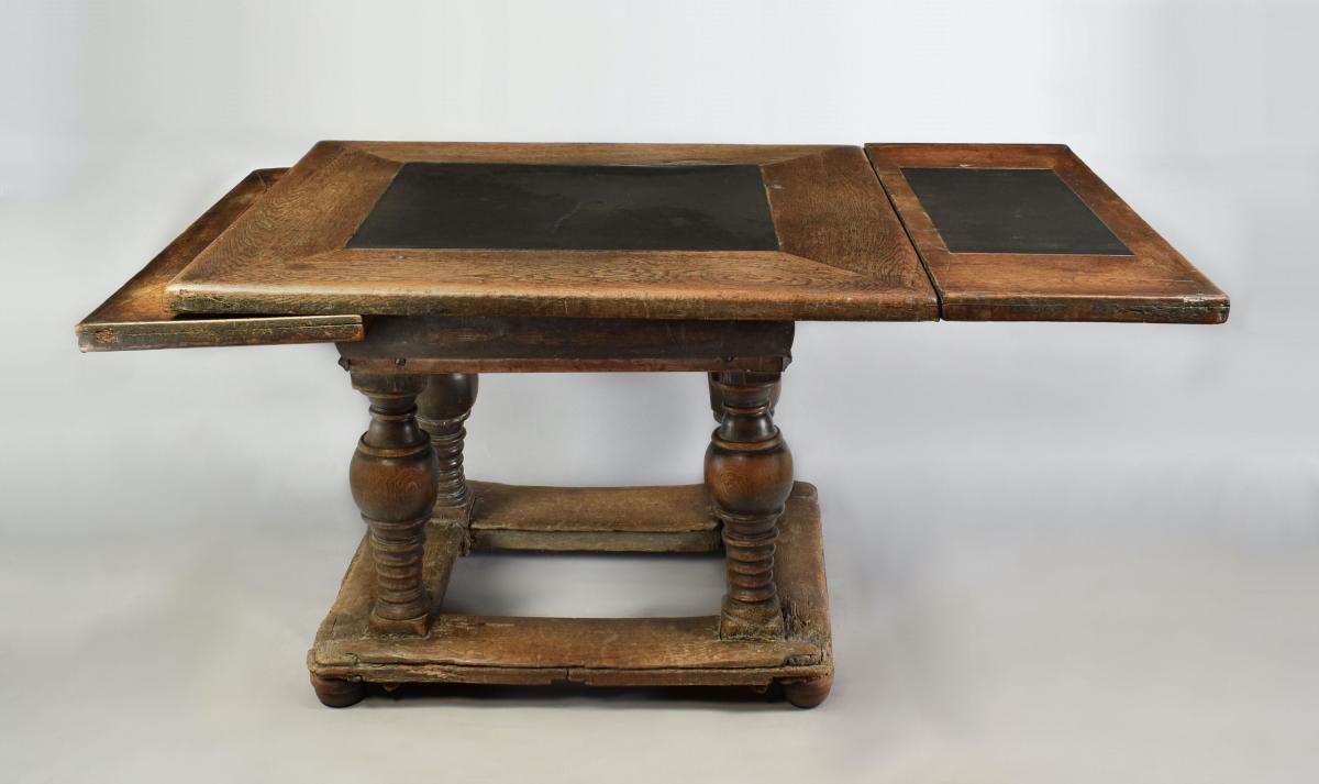 Flemish oak drawleaf table with inset slate tops, c.1650
