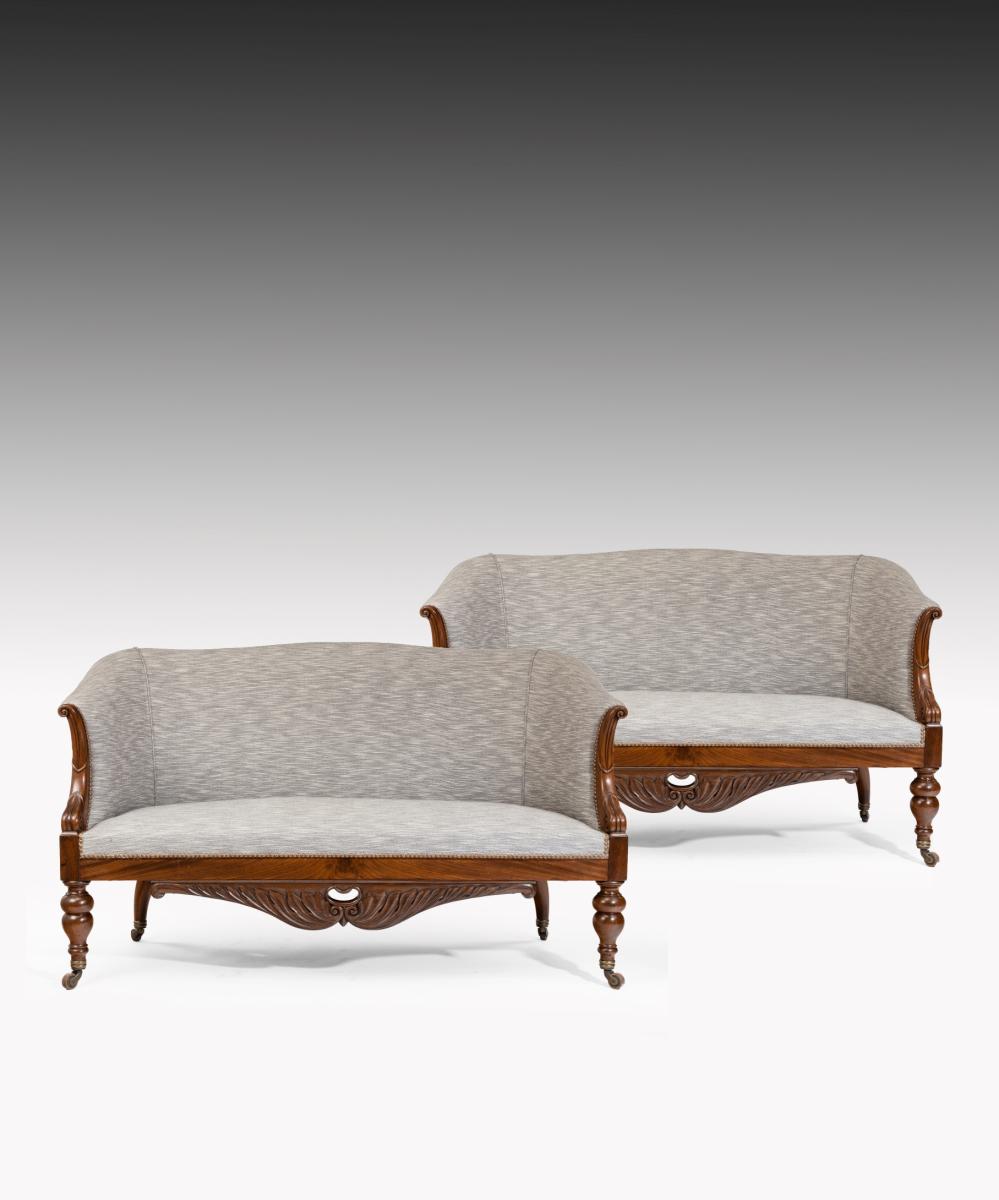 Antique pair of Charles X Sofas With Carved Mahogany Showwood Frames