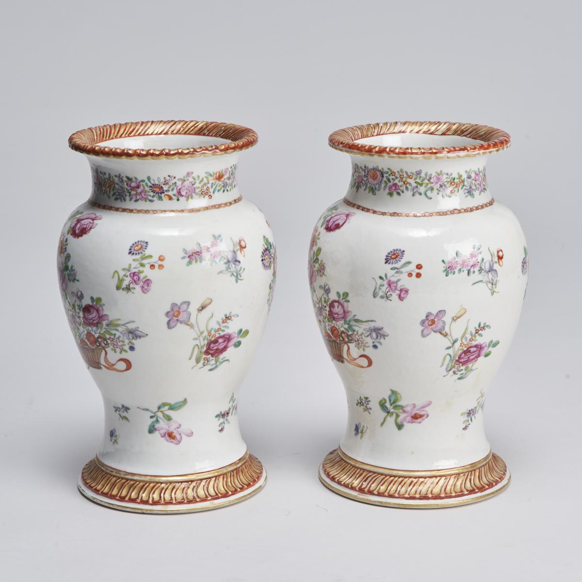 An elegant pair of 18th Century Chinese export Famille Rose vases