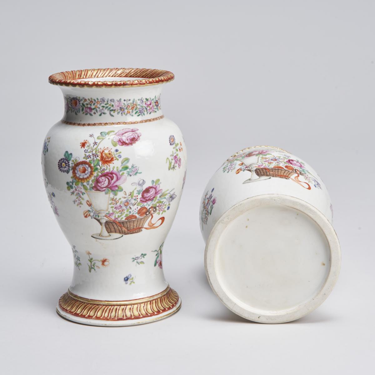 An elegant pair of 18th Century Chinese export Famille Rose vases