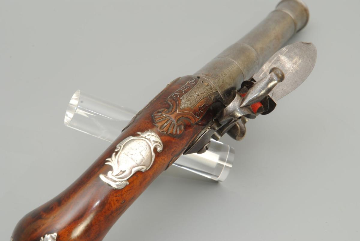 A Pair Of 18th Century 22 Bore Silver Mounted Turn Off Barrel Pistols.