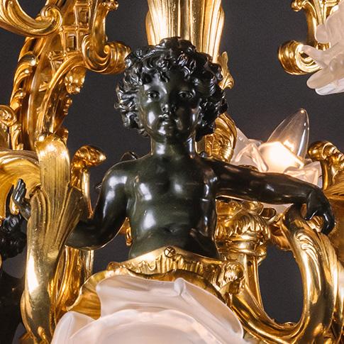 An Impressive Belle Epoque Gilt and Patinated Bronze Twenty-One Light Chandelier