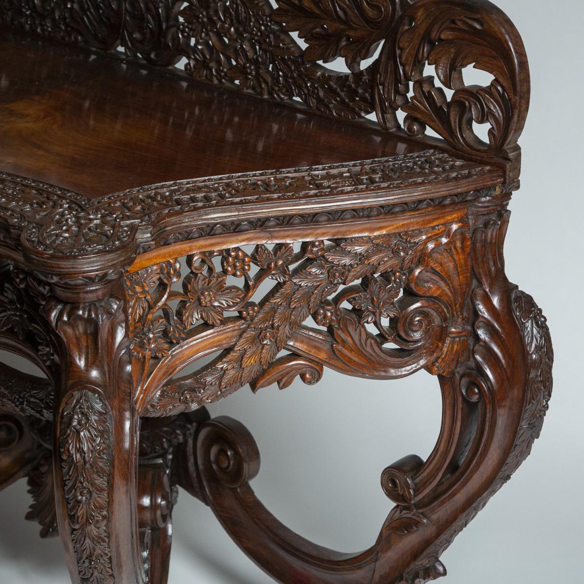 Late 19th century highly carved teak console table