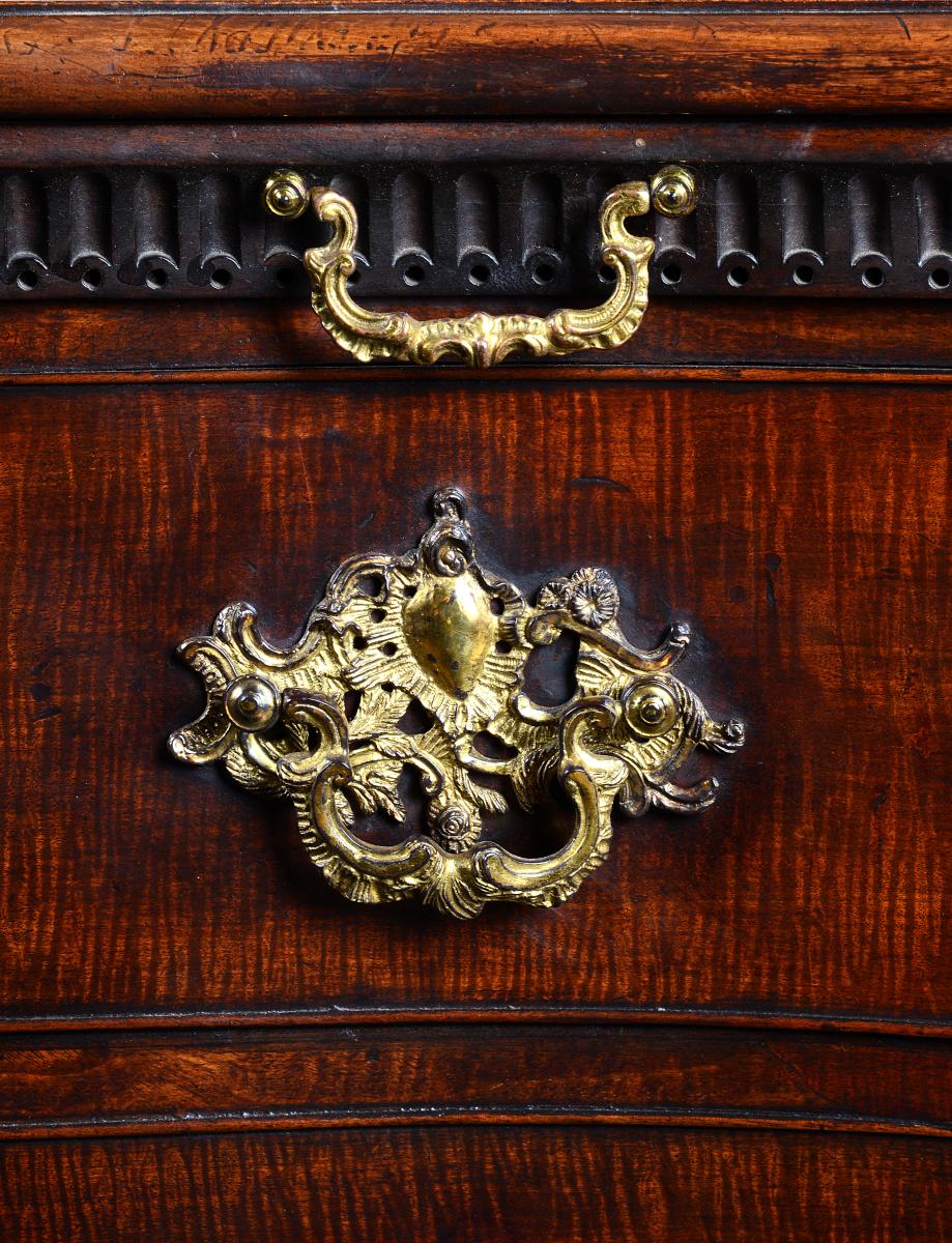 A Highly Important Pair of George II Period Serpentine Fronted Mahogany Commodes Attributed to the Workshop of William Vile or William Hallett. The Carving Possibly by John Boson