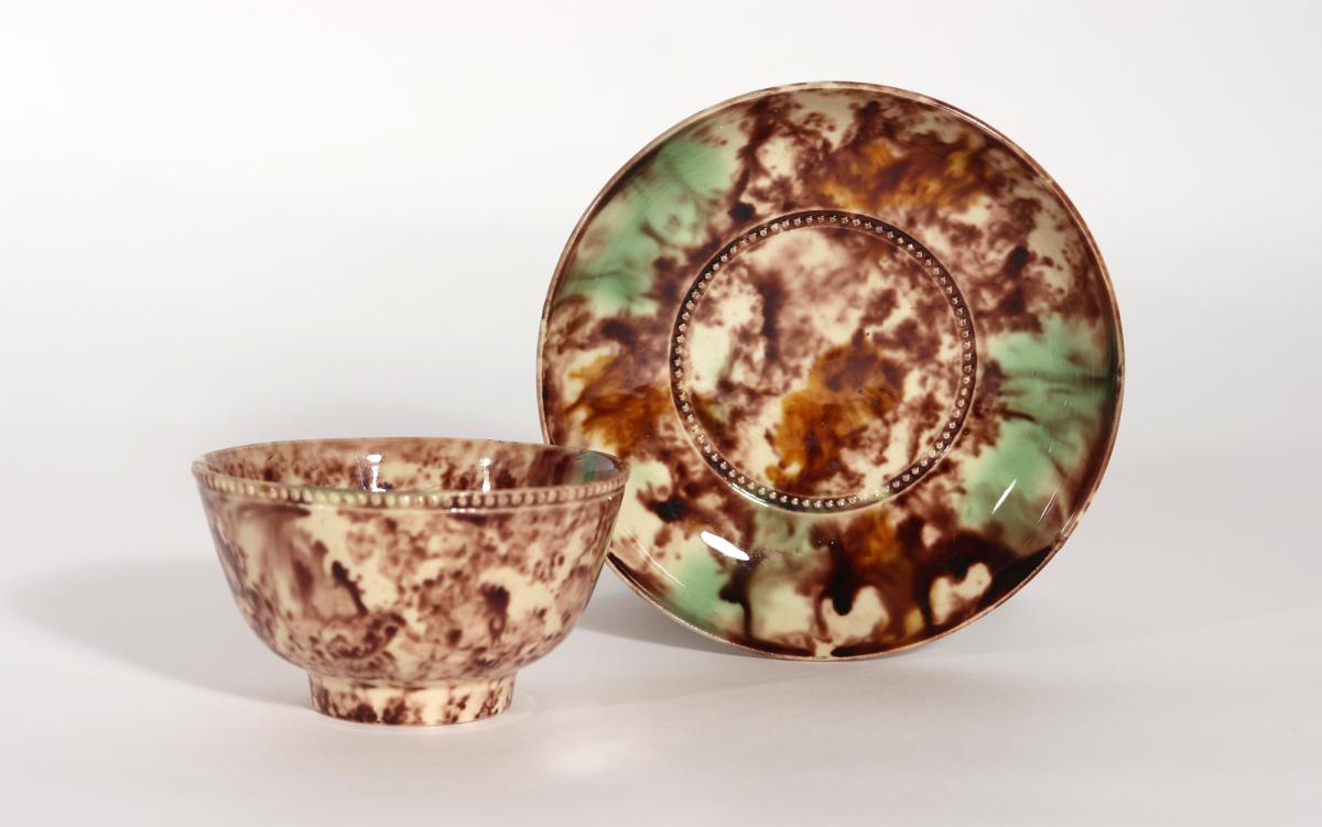 English Creamware Whieldon-type Tortoiseshell Tea Bowl & Saucer,  Circa 1765-75.