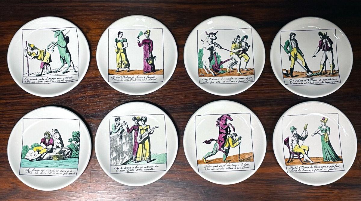 Piero Fornasetti Set of Eight Coasters, Il Mondo Alla Rovecia Pattern, (“The topsy-turvy world”),