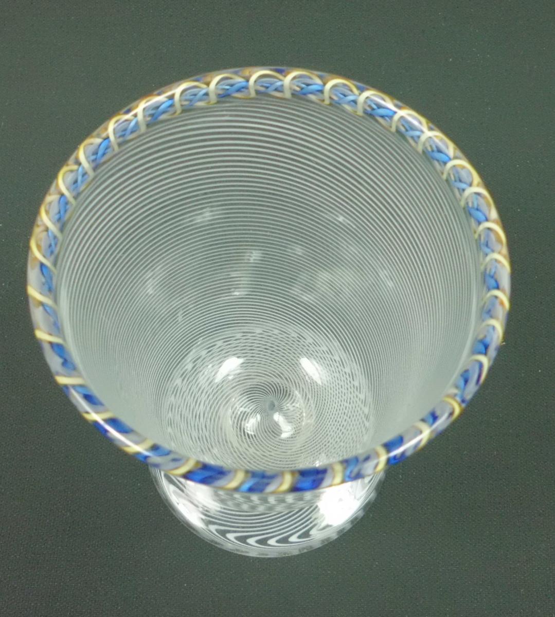 White latticinio glass beaker with blue and yellow glass cane rim, St. Louis, France circa 1860
