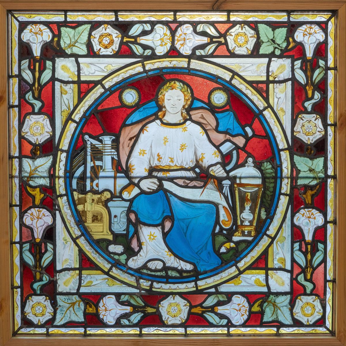 Gothic revival painted, stained and leaded glass panel depicting Science