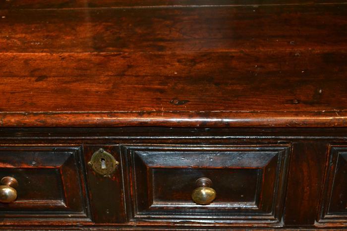 An impressive Charles II oak low dresser