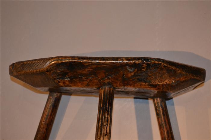 Primitive ash three legged stool