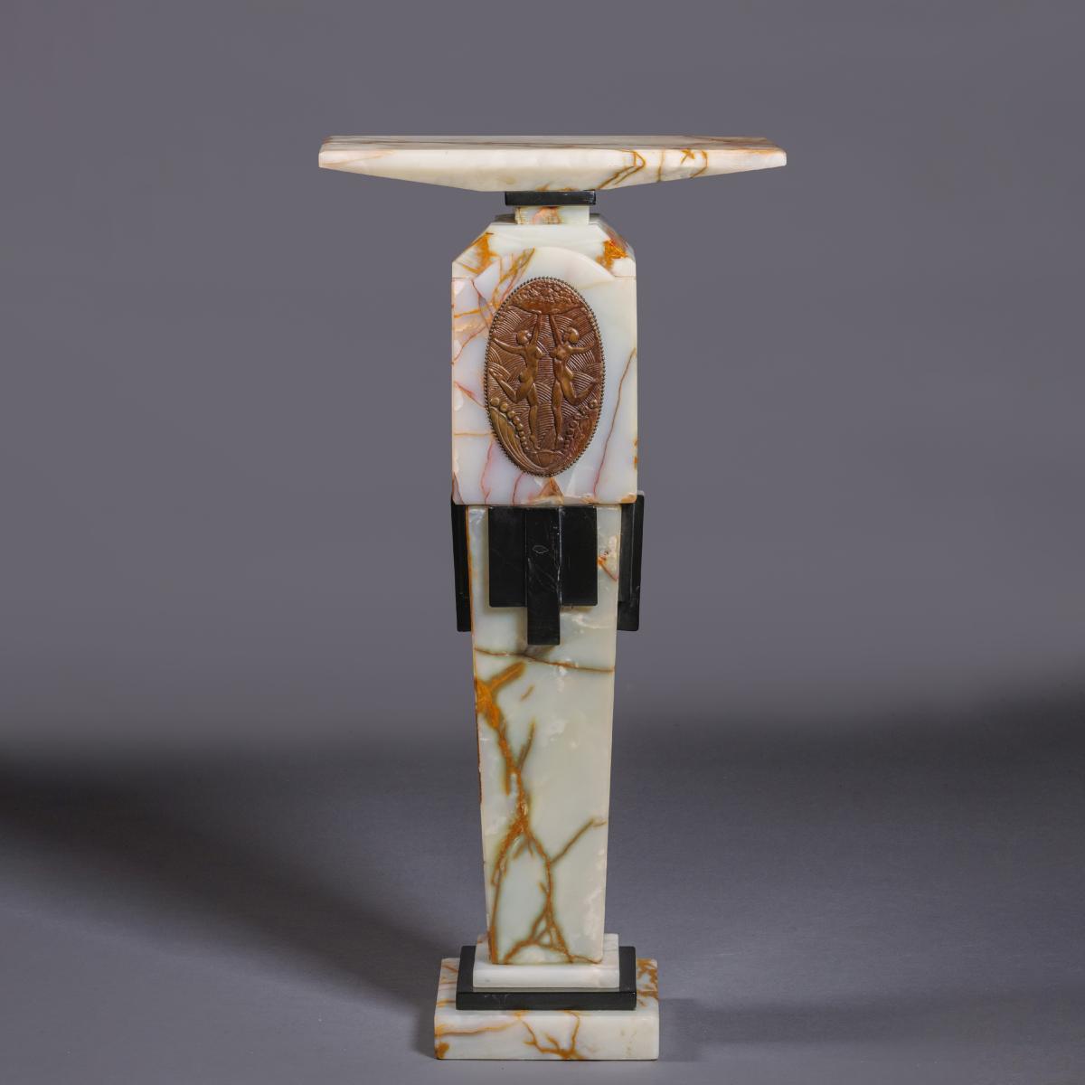 An 'Art Deco' Patinated Bronze, Onyx and Polished Slate Pedestal By Demétre Chiparus