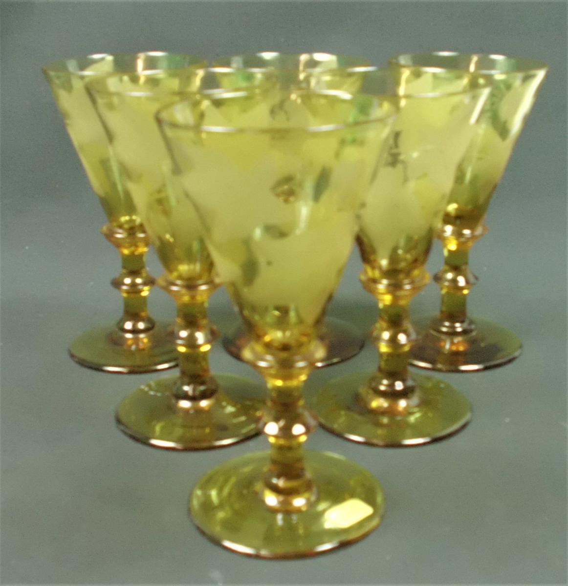 six amber wine glasses