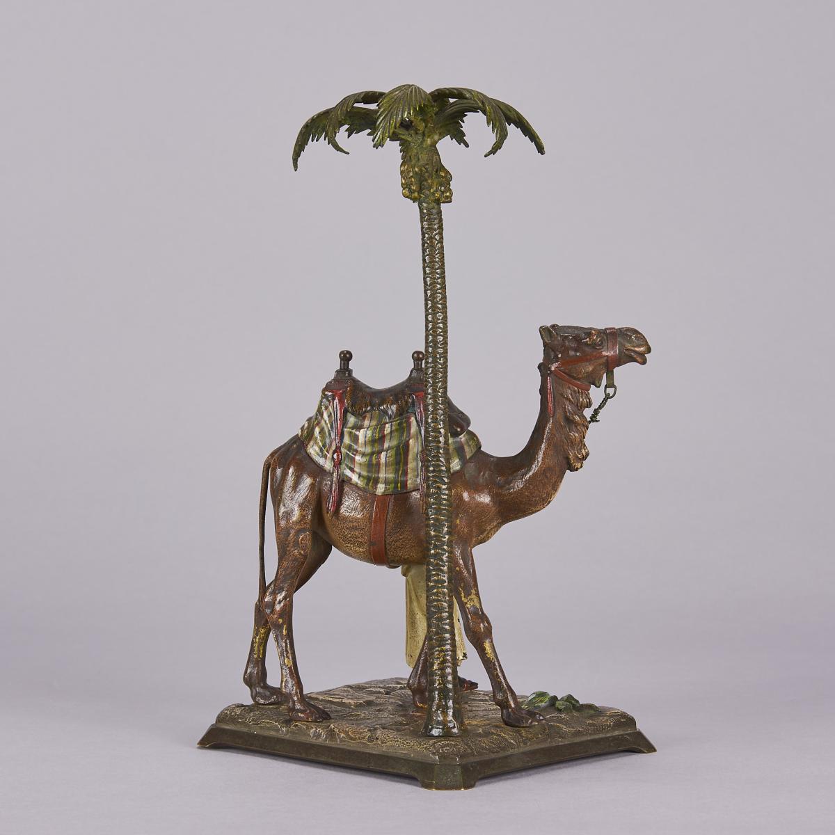Cold-Painted Austrian Bronze entitled "Bedouin with Camel under Palm Tree" by Franz Bergman