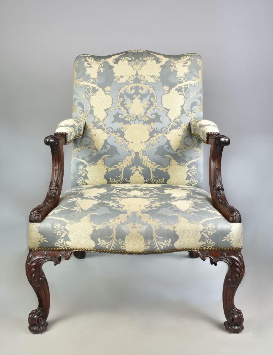 An exceptional George III mahogany Gainsborough chair attributed to Thomas Chippendale, c.1766