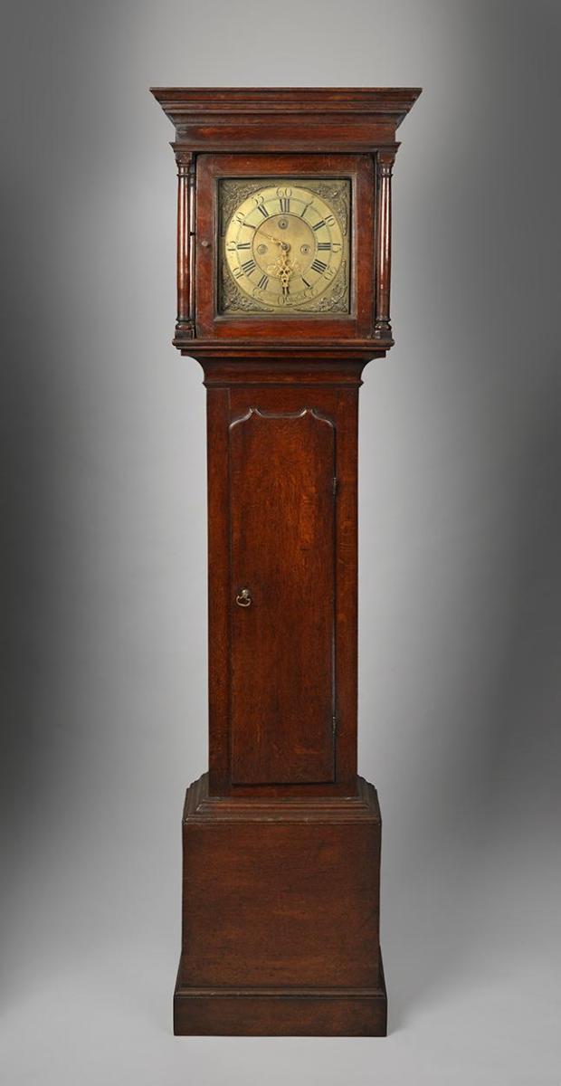 A Traditional Vernacular Thirty Hour Longcase Clock With Two Handed Brass Face Movement  by James Hendrie of Wigton Ricjly Patinated and Nutty Coloured Oak with Brass and Vaiours Media English, North Country, c.1780