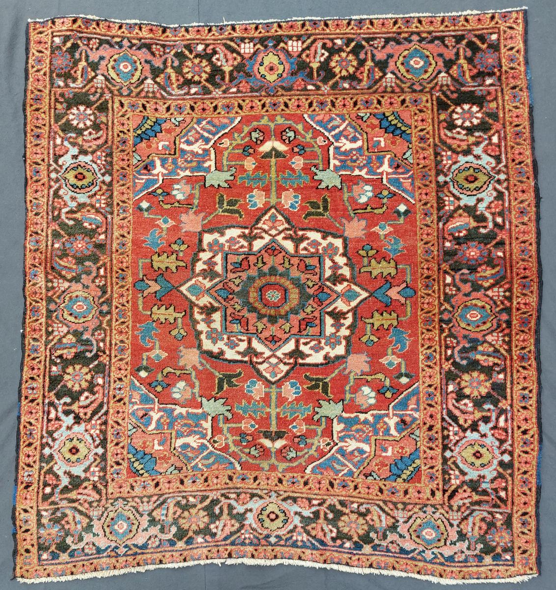 small square Heriz rug