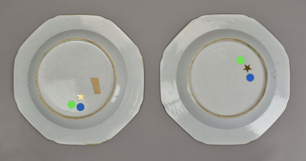 Two from a set of eight Chien Lung period octagonal plates bearing the arms of the Moleson family of Aberdeen, c.1755