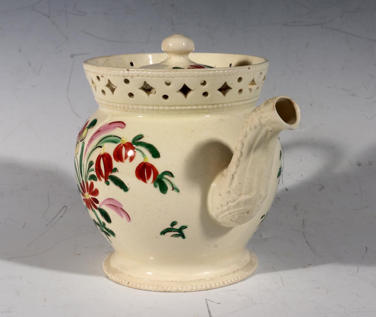 Creamware Chinoiserie Teapot and Cover with Openwork Gallery