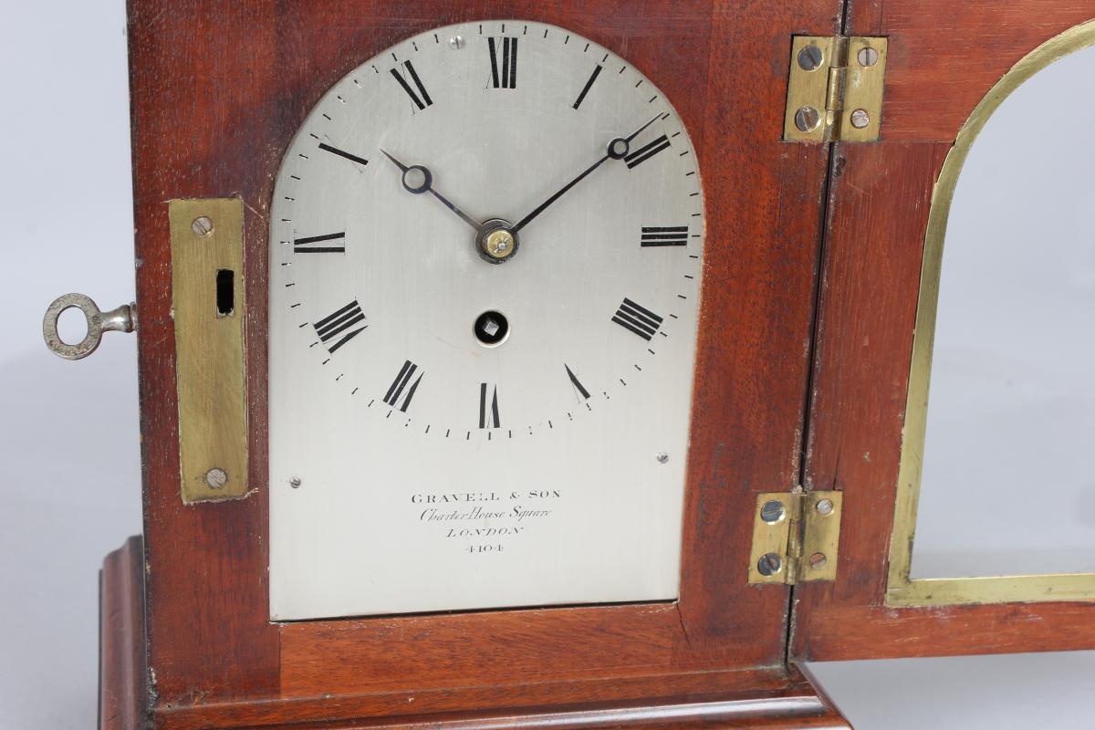 George IV period mahogany mantel / library clock